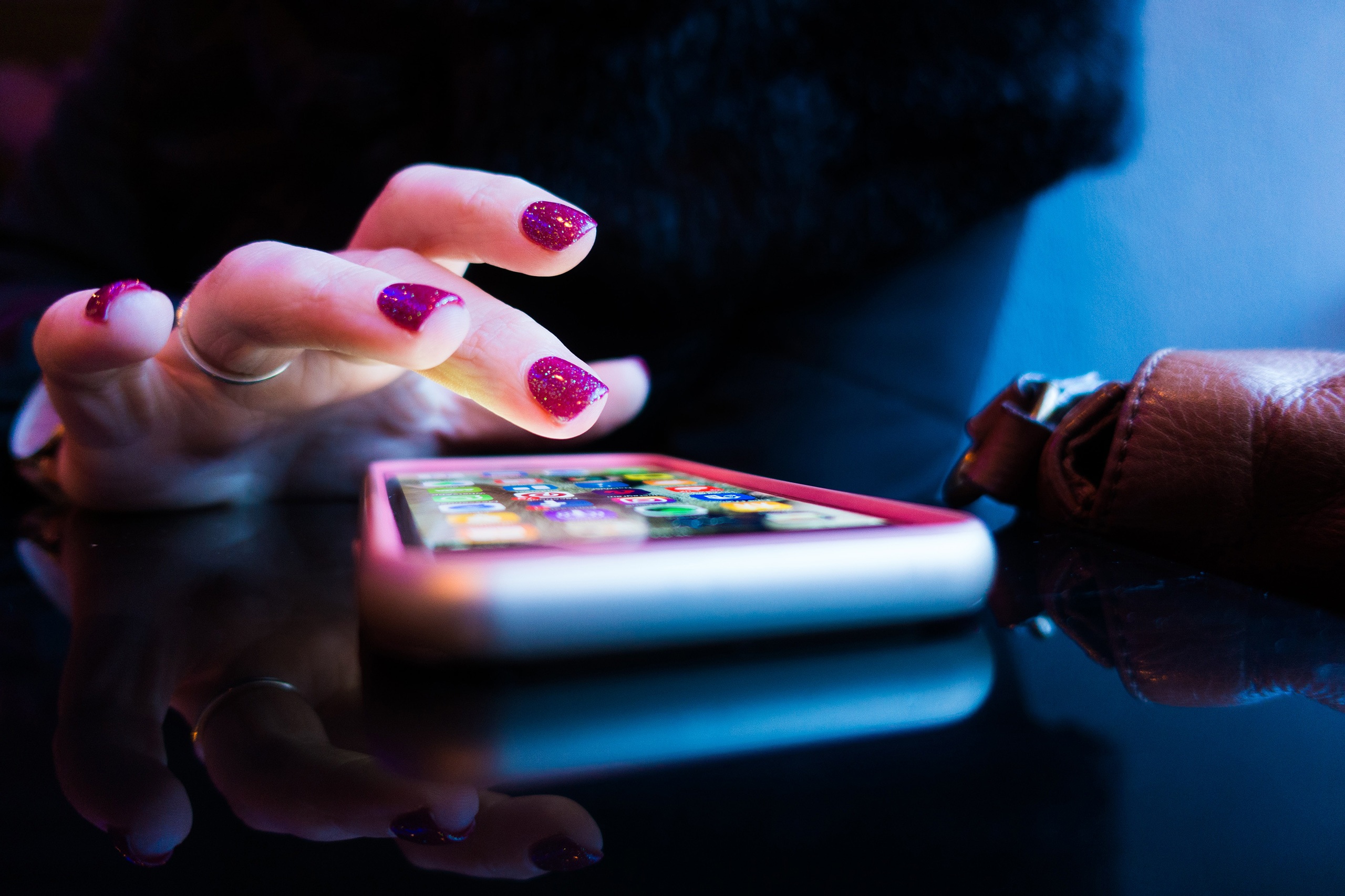 Close up of a person using a smartphone.