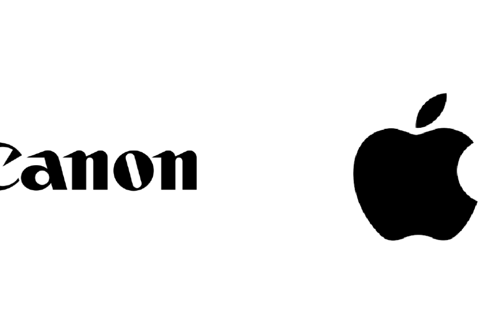 Black and white logos for Lego, Canon, Apple, and Adobe