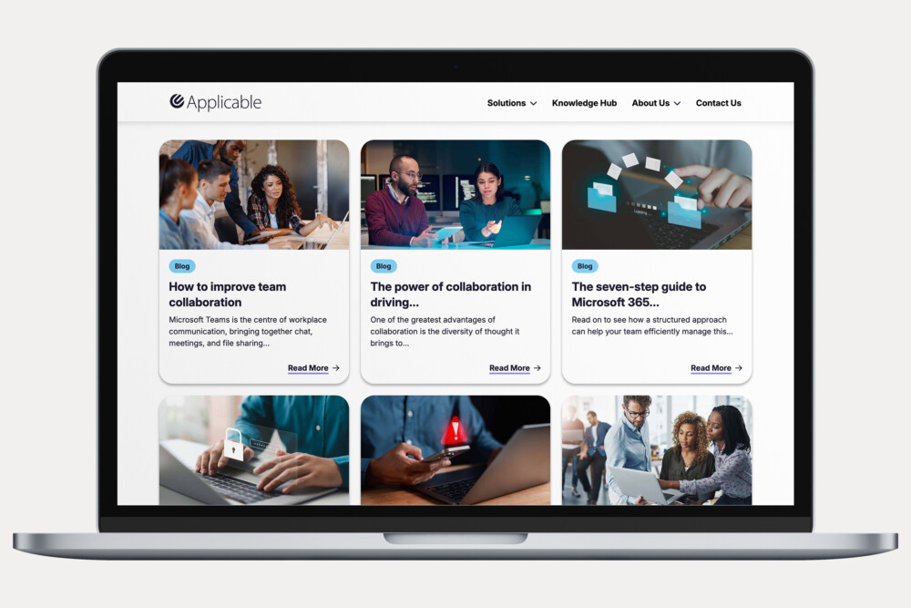 A laptop showing Applicable's website knowledge hub design